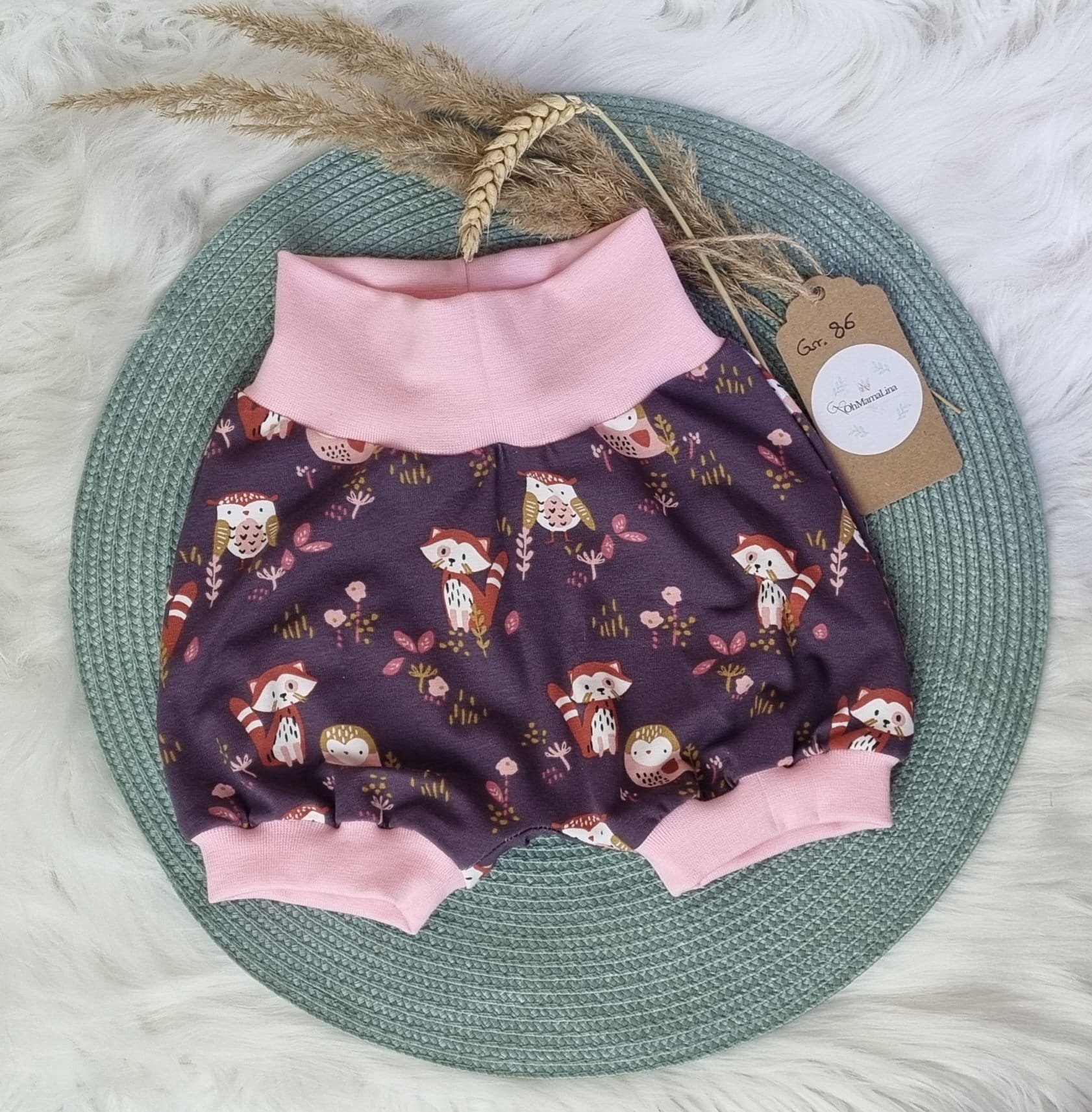 Handgemachte Pumphose Baby & Kleinkind Eule & Fuchs Mauve mit Zart-Rosa Bündchen – Vorderansicht liegend, Flatlay Größe 86